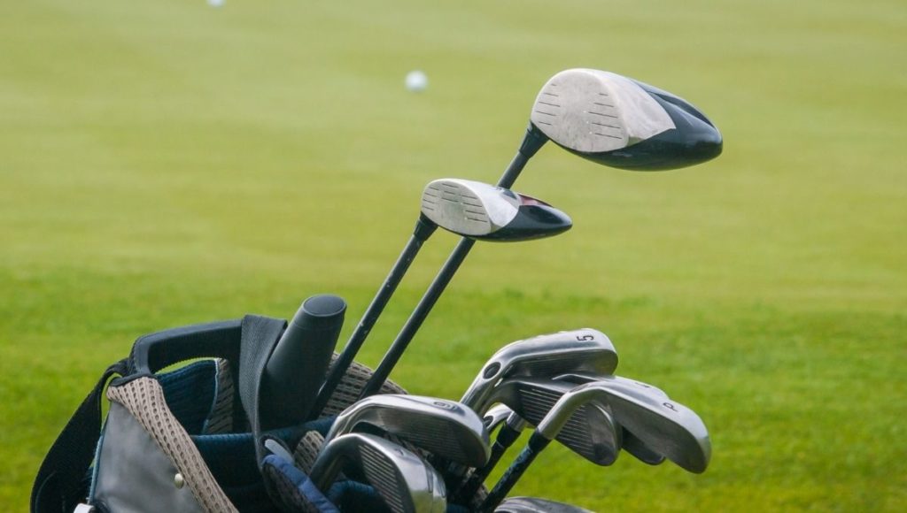 A set of golf clubs with graphite shaft in the bag