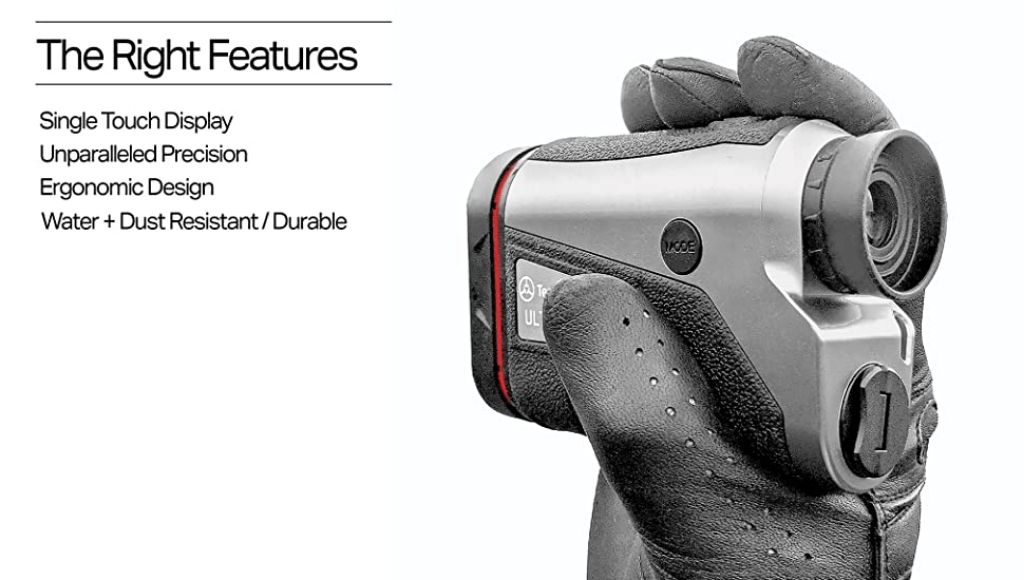 There's a hand holding tectectec ult-s pro golf rangefinder