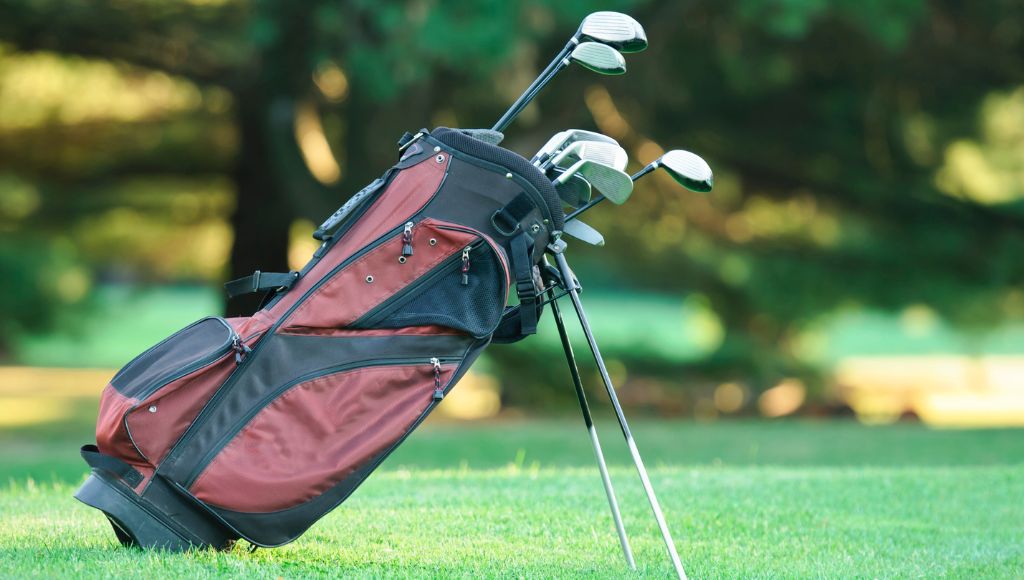 A golf bag on the golf ground green grass